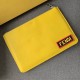 F family thin clutch bag in yellow calf leather, with FEN and THINK lettering on the back with appliqués inspired by the FE VOCABULARY theme and multicolored rubber details, zipper closure and palladium-finish metal hard