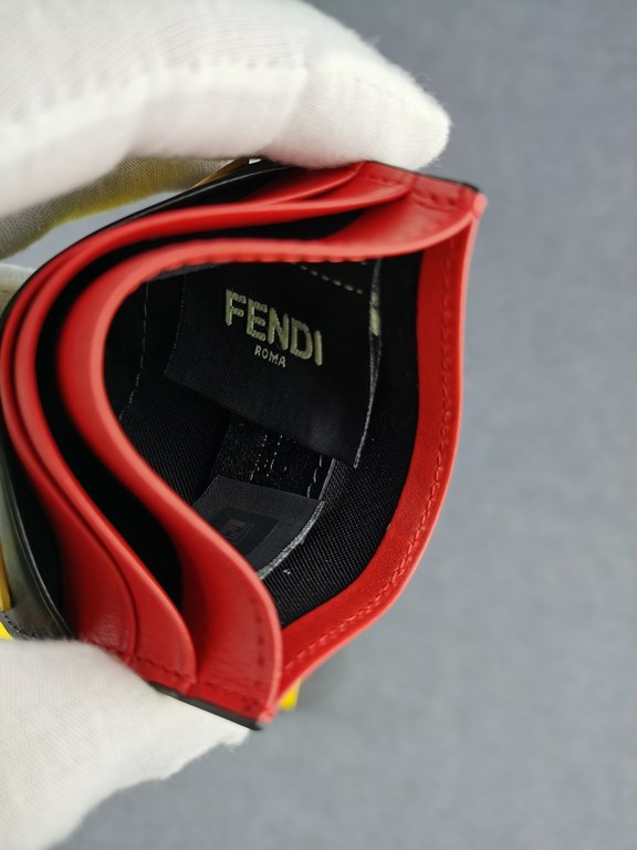 Brand FENDIStyle Black, Red and Yellow Sticker Card CaseItem No. 2020568Color Black RedMaterial First layer imported Napa cow leatherSize 10.59FENDI short clip card bag Introduction 20 years of spring and summer of the l