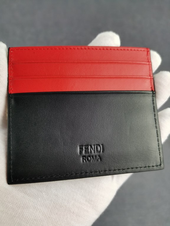 Brand FENDIStyle Black, Red and Yellow Sticker Card CaseItem No. 2020568Color Black RedMaterial First layer imported Napa cow leatherSize 10.59FENDI short clip card bag Introduction 20 years of spring and summer of the l