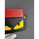 Brand FENDIStyle Black, Red and Yellow Sticker Card CaseItem No. 2020568Color Black RedMaterial First layer imported Napa cow leatherSize 10.59FENDI short clip card bag Introduction 20 years of spring and summer of the l