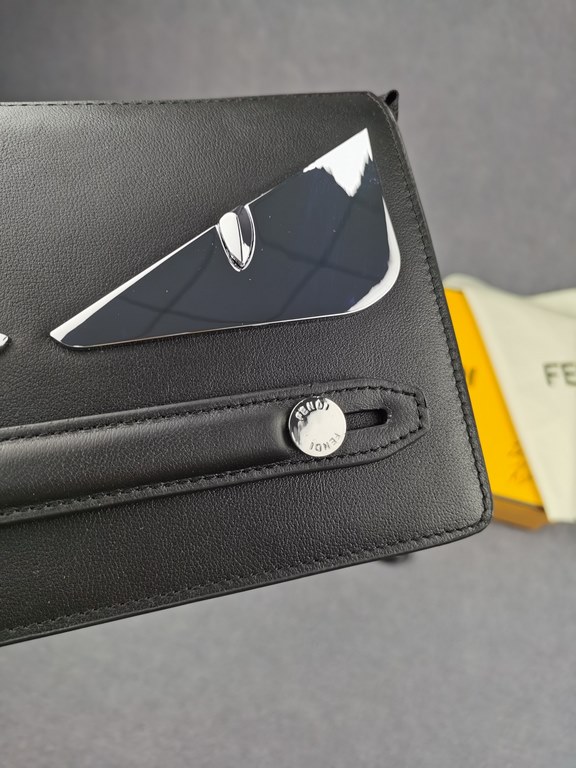 Brand FENDIModel No. Silver Clutch BagItem No. 768568Color Black SilverMaterial First layer imported nappa cow leatherSize 23155F family Fendi clutch bag in calf leather with metallic BAG BUGS eye motif and matching colo