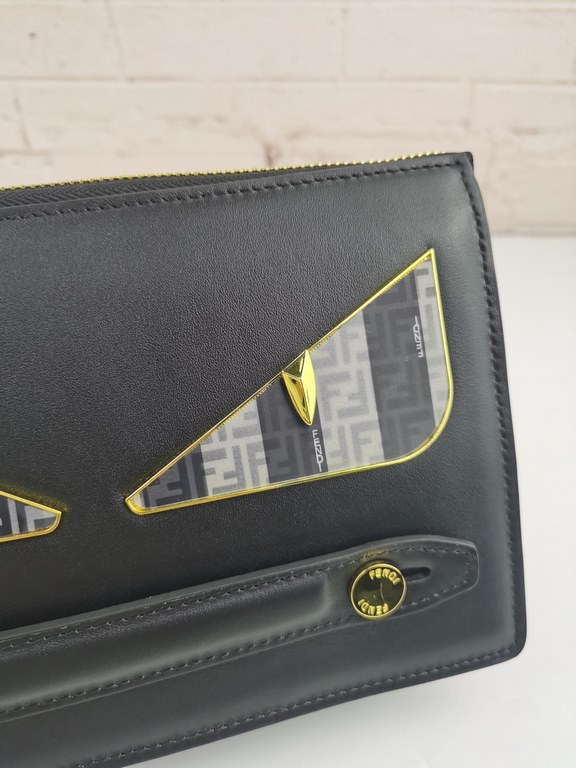 Brand FENDIModel Letter Clutch BagItem No. 768568Color black   lettersMaterial imported nappa cowhide leatherSize 23155F family Fendi clutch bag in calf leather with metallic BAG BUGS eye motif and matching color trim, 3