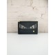 Brand FENDIModel Letter Clutch BagItem No. 768568Color black   lettersMaterial imported nappa cowhide leatherSize 23155F family Fendi clutch bag in calf leather with metallic BAG BUGS eye motif and matching color trim, 3