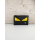 Brand FENDI FendiItem No. Men's Clutch Bag with Snake Print and Yellow StickerItem No. 768568Color black   egg yolkMaterial first layer imported Lychee grain cowhide leatherSize 23155F family fendi clutch bag in calf lea