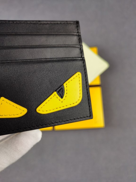 Brand FENDIStyle Black and Yellow Card CaseItem No. 2020568Color black   lemon yellowMaterial First layer imported Napa cow leatherSize 10.59FENDI short clip card bag Introduction 20 years of spring and summer of the lat