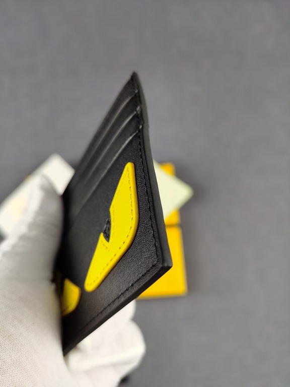 Brand FENDIStyle Black and Yellow Card CaseItem No. 2020568Color black   lemon yellowMaterial First layer imported Napa cow leatherSize 10.59FENDI short clip card bag Introduction 20 years of spring and summer of the lat