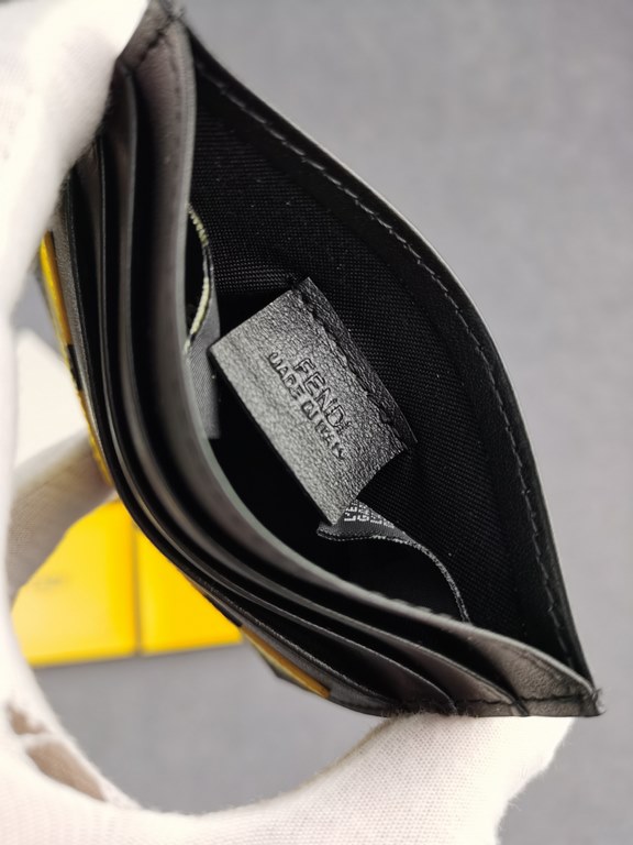 Brand FENDIStyle Black and Yellow Card CaseItem No. 2020568Color black   lemon yellowMaterial First layer imported Napa cow leatherSize 10.59FENDI short clip card bag Introduction 20 years of spring and summer of the lat