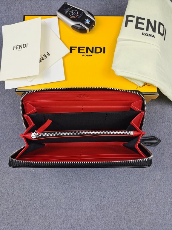 Brand FENDIStyle Single pull with white stickerItem No. 868568Color Black WhiteSize 19.510.53Material large surface with imported first layer Napa cowhide, lining with red sheepskin, feel delicateFENDI zipper wallet Intr