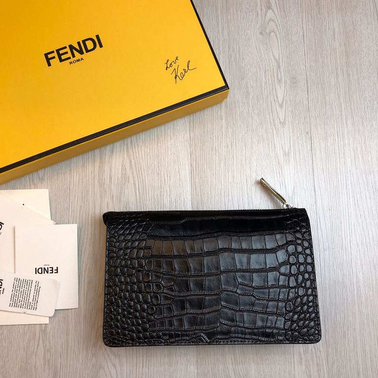 F family Fendi clutch bag in calf leather, decorated with a metallic BAG BUGS eye motif and panels in the same color, 3 internal compartments with 8 card slots, a large crotch-access pocket and an organizer compartment, 