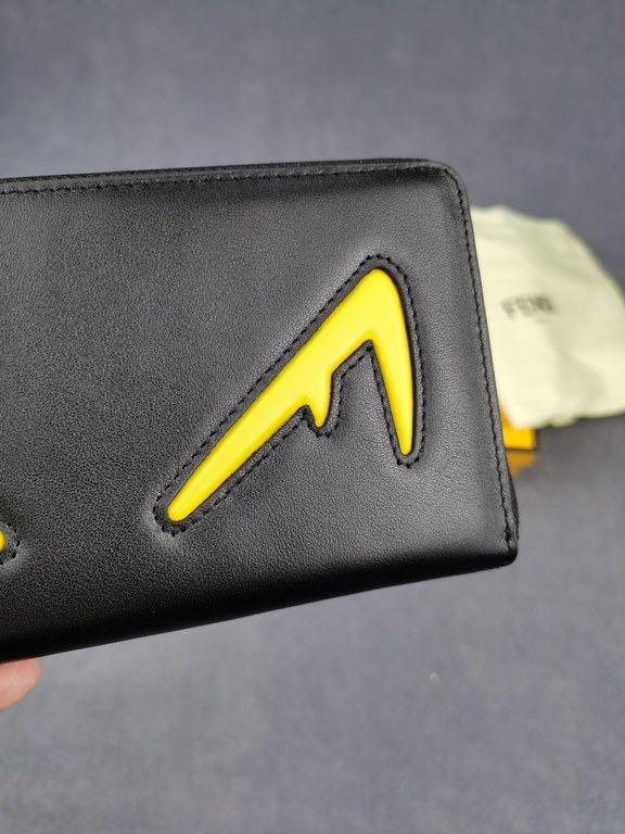 Brand FENDI FendiModel No. Yellow F Single PullItem No. 868568Color blackSize 19.510.53Material large surface with imported first layer Napa cowhide, lining with black sheepskin, feel delicateFENDI zipper wallet Introduc