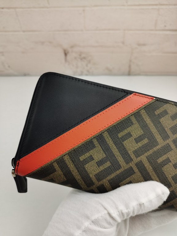 Brand FENDIModel No. PVC red single pullItem No. 868568Color BrownSize 19.510.53Material imported head layer nappa cowhide   double letters PVC, lining with black sheepskin, delicate feelFENDI zipper wallet Introduction 