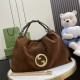 .   With a full set of original green gift bags  Gucci Blondie Collection Large Tote Bag. The Gucci Blondie collection is crafted with the round, interlocking double G's of the brand's iconic design. The Gucci Blondie to