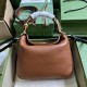 .   Comes with a full set of original green box packaging  Gucci Diana Bamboo Small Shoulder Bag. This Gucci Diana bamboo handbag combines two recognizable brand elements bamboo handles and double G hardware. Crafted fro