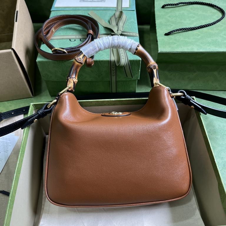 .   Comes with a full set of original green box packaging  Gucci Diana Bamboo Small Shoulder Bag. This Gucci Diana bamboo handbag combines two recognizable brand elements bamboo handles and double G hardware. Crafted fro