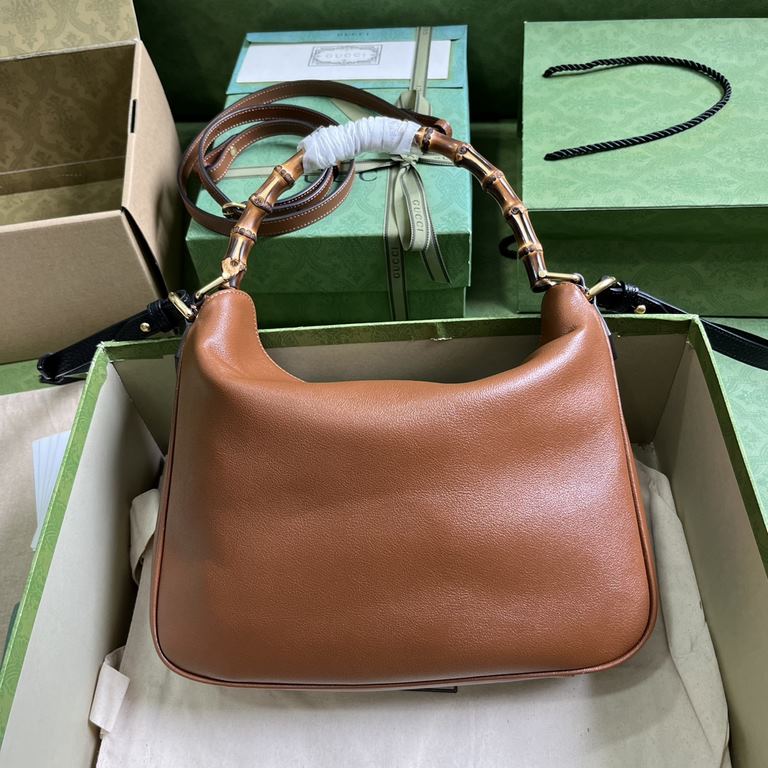 .   Comes with a full set of original green box packaging  Gucci Diana Collection Medium Shoulder Backpack. The small shoulder bag combines two of the brand's most recognizable elements - the bamboo handle and the double