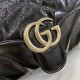 .   Comes with a full set of original green box packaging   GGG Marmont Collection Small Shoulder Backpack. Soft and padded, this GG Marmont shoulder bag is crafted from black patent GG Matelassé leather and embellished 