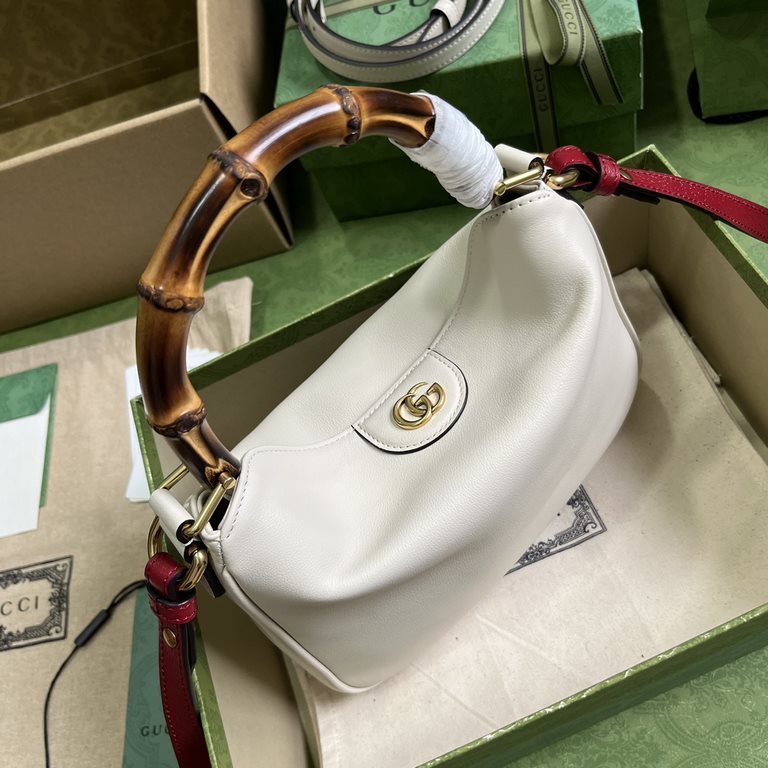 .   Comes with a full set of original green box packaging  Gucci Diana Bamboo Small Shoulder Bag. This Gucci Diana bamboo handbag combines two recognizable brand elements bamboo handles and double G hardware. Crafted fro