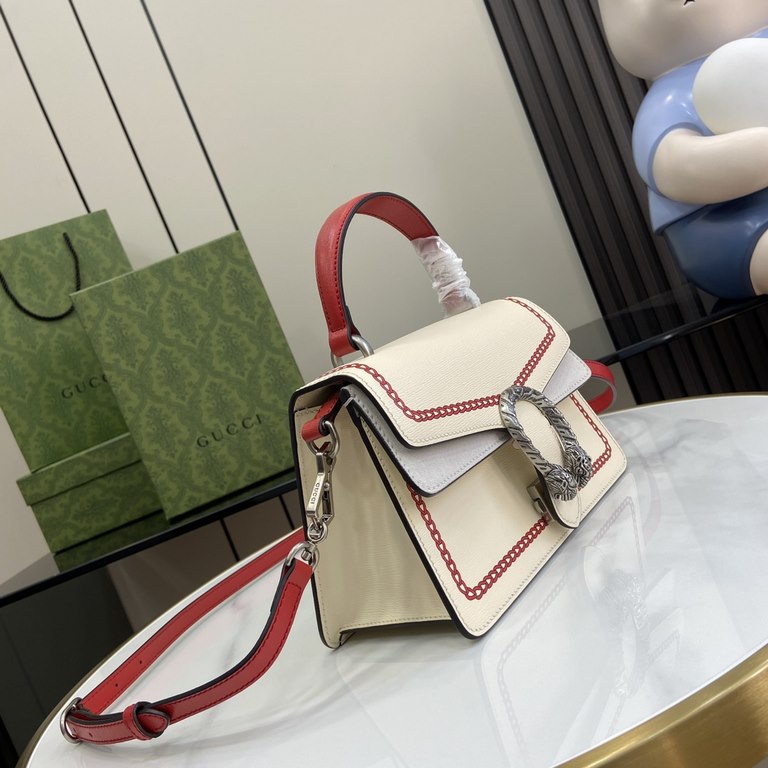 .   With a full set of original green box packaging   Chinese New Year collection Dionysus small handbag. To celebrate the Chinese New Year of the Dragon, the brand has created a selection of ready-to-wear garments and a