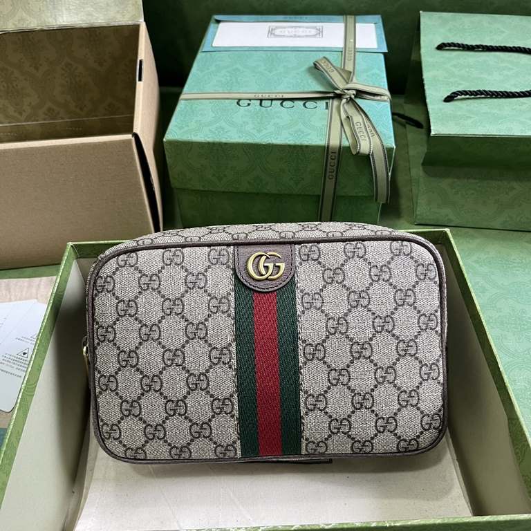 .   Comes with a full set of original green box packaging  Gucci Savoy Collection Trimmed Webbing Wash Bag. Since its inception in the 1960s, the GG Supreme canvas has evolved to complement the brand's collections. The i