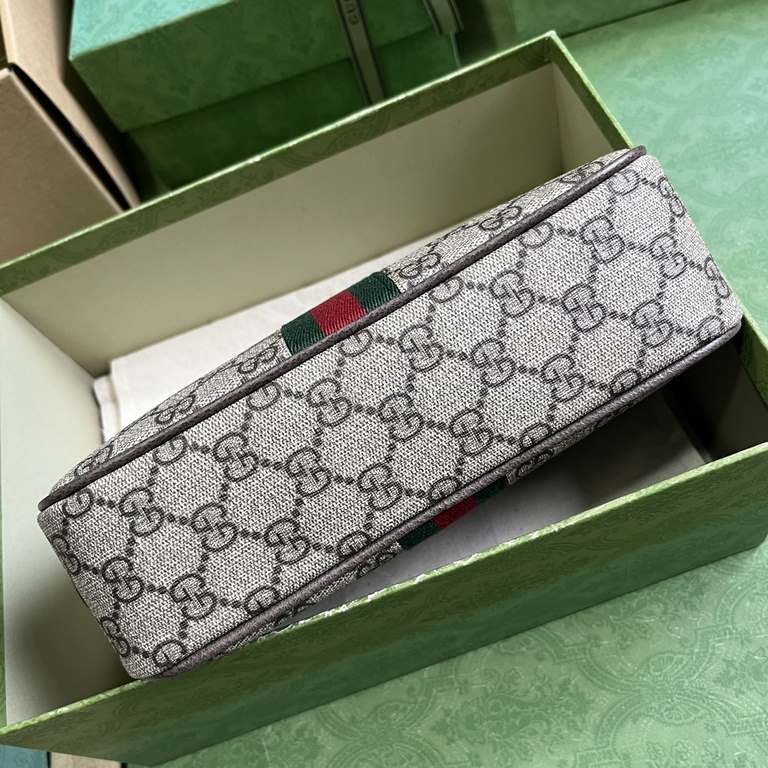 .   Comes with a full set of original green box packaging  Gucci Savoy Collection Trimmed Webbing Wash Bag. Since its inception in the 1960s, the GG Supreme canvas has evolved to complement the brand's collections. The i