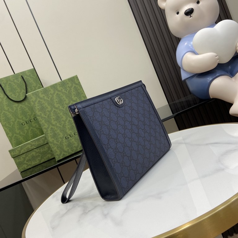 .   Packaged in the original green box   Ophidia GG Clutch Bag. The Ophidia collection is an eye-catching fusion of Gucci's heritage and contemporary design. Crafted in gray and blue GG Supreme canvas, the clutch is ador