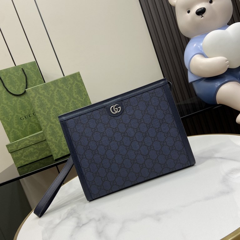 .   Packaged in the original green box   Ophidia GG Clutch Bag. The Ophidia collection is an eye-catching fusion of Gucci's heritage and contemporary design. Crafted in gray and blue GG Supreme canvas, the clutch is ador