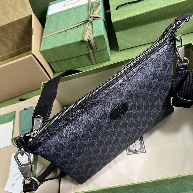 .   with full original green box packaging   interlocking double G messenger bag.Drawing on vintage travel inspiration, the black GG Supreme canvas luggage from Gucci's latest collection pays homage to Mr. Guccio Gucci's