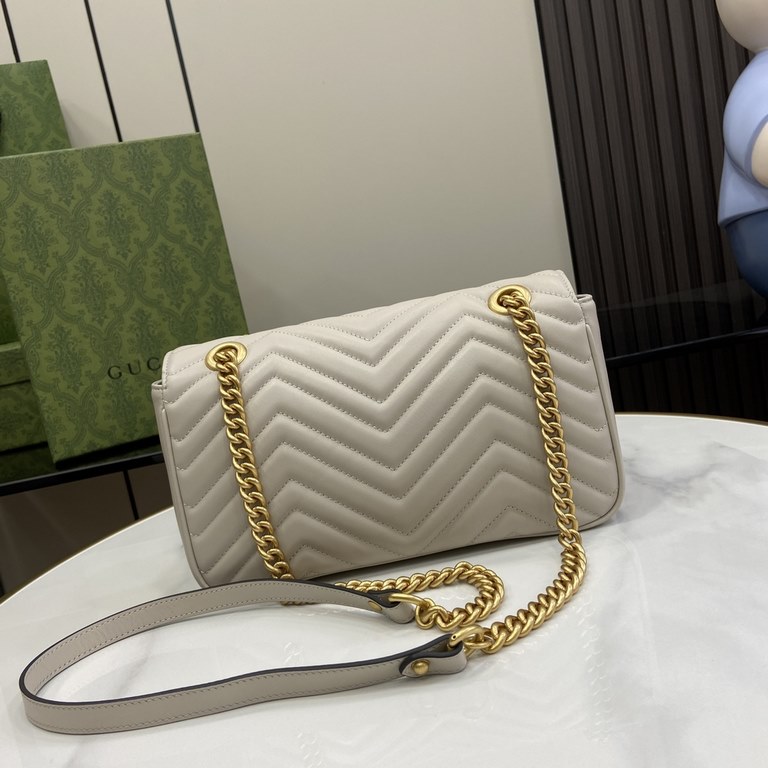 .   with a full set of original green box packaging   original leather [New] GG Marmont series quilted mini handbag. This GG Marmont series mini handbag is made of highly recognizable shape, neutral light beige quilted V