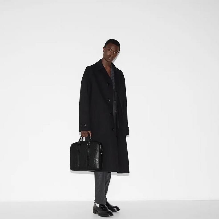 Super Double G BriefcaseModel No.792264 AABY0 1000The Super Double G continues to reinterpret the brand's logo in a larger version that makes a statement in the new collection. The iconic pattern is presented in black in