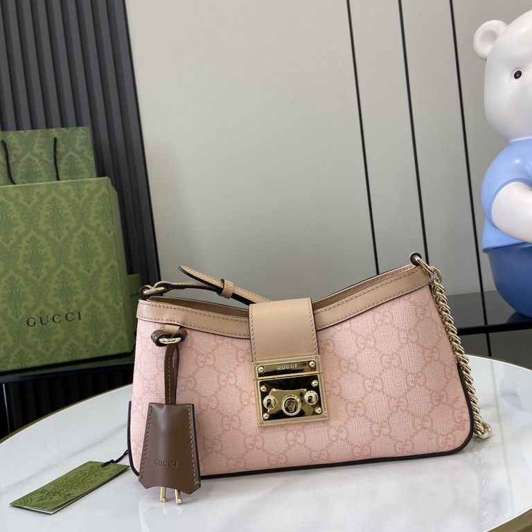 .   With full set of original green box packaging   [New] GG Padlock Collection Small Shoulder Backpack. Inspired by the origins of the brand's handmade luggage workshop, this small shoulder bag is crafted from gray-pink