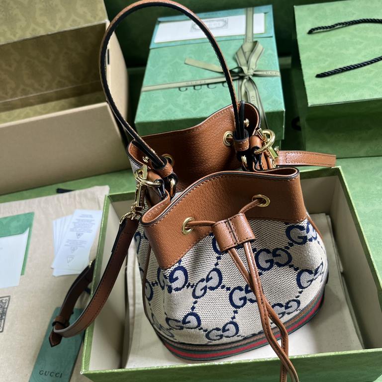 .  Comes with a full set of original green box packaging Ophidia Collection Small GG Bucket Bag.The Ophidia Collection welcomes a new addition to its lineup - the Bucket Bag. Made of GG Supreme canvas with red and green 