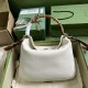 .   Comes with a full set of original green box packaging  Gucci Diana Collection Medium Shoulder Backpack. The small shoulder bag combines two of the brand's most recognizable elements - the bamboo handle and the double