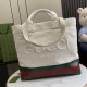 .   With a full set of original green gift bags   [New] GG embellished embossed detail canvas tote bag. From the Gucci Lido collection, this piece is inspired by the summer flavors and beach clubs of the Italian coast. C