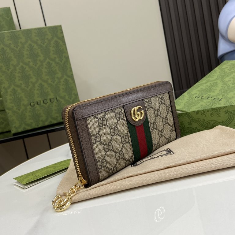 .   Comes with a full set of original green box packaging  Ophidia Collection GG full zipper wallet. Introduced in the 1970s, the GG logo evolved from the early Gucci diamond diamond check pattern that began in the 1930s