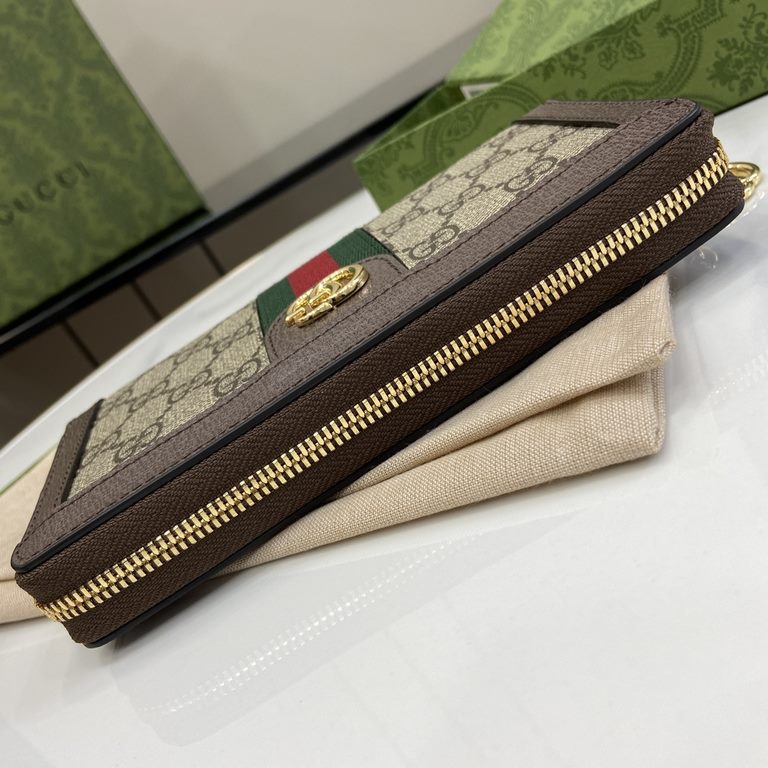 .   Comes with a full set of original green box packaging  Ophidia Collection GG full zipper wallet. Introduced in the 1970s, the GG logo evolved from the early Gucci diamond diamond check pattern that began in the 1930s