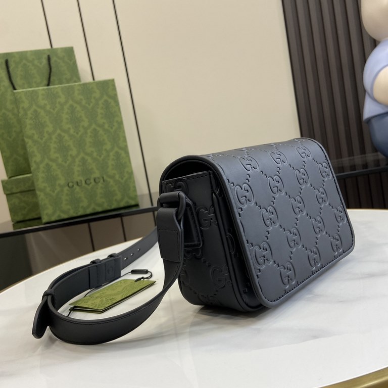 .   With a full set of original green box packaging  GG rubber effect ultra mini handbags. A selection of mini satchels, briefcases and tote bags with practical details for a new look. Crafted from black GGG rubber-effec