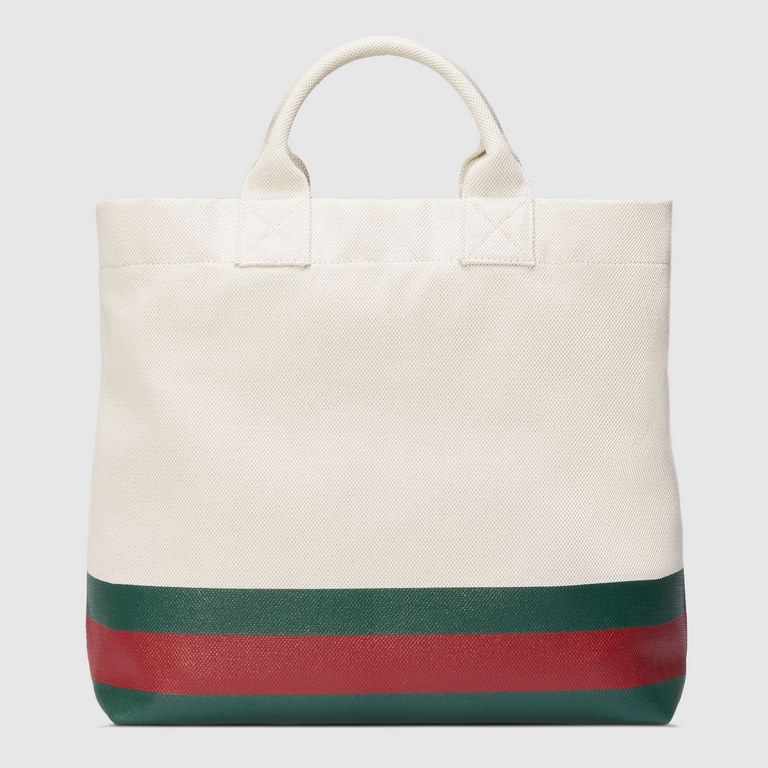 embellished embossed detail canvas tote bagModel No. 782741 FAC4W 8477782741 fac4w 8477From Gucci's Lido collection, this piece is inspired by summer and beach clubs along the Italian coast. Crafted in a casual silhouett