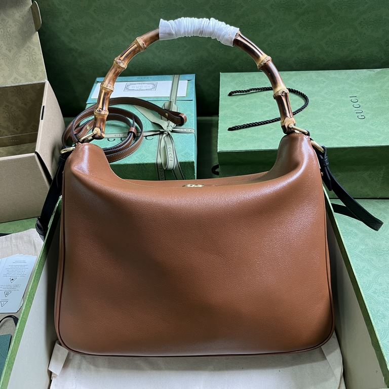 .   With full original green box packaging  Gucci Diana Collection Large Shoulder Backpack. This medium shoulder bag combines two of the brand's most recognizable elements - the bamboo handle and the double G - to give t