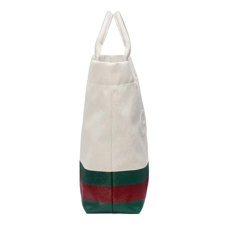 embellished embossed detail canvas tote bagModel No. 779510 FAC4W 8477779510 fac4w 8477From Gucci's Lido collection, this piece is inspired by the Italian coast's summer flavor and beach clubs. Crafted in a casual silhou