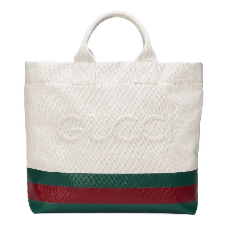 embellished embossed detail canvas tote bagModel No. 779510 FAC4W 8477779510 fac4w 8477From Gucci's Lido collection, this piece is inspired by the Italian coast's summer flavor and beach clubs. Crafted in a casual silhou