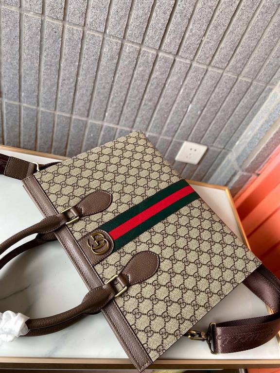 9127 Black Brown  High-end   The new GUCCI Ophidia collection presents a new design briefcase in GG Supreme synthetic canvas, featuring the brand's iconic webbing and double G-shaped hardware. The double handles and deta