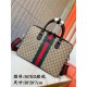 387102 High-end   The new GUCCI Ophidia collection presents a new design briefcase in GG Supreme synthetic canvas, featuring the brand's iconic webbing and double G-shaped hardware. The double handles and detachable shou