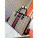 387102 High-end   The new GUCCI Ophidia collection presents a new design briefcase in GG Supreme synthetic canvas, featuring the brand's iconic webbing and double G-shaped hardware. The double handles and detachable shou