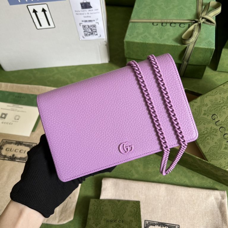 .   Packaged in a full set of original green boxes   This chain strap wallet from the GG Marmont collection revitalizes a design from previous collections and is crafted in a crisp lilac leather, bringing a stunning piec