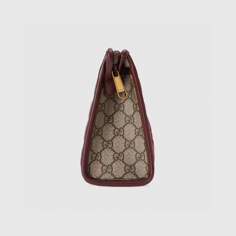 Mini GG Canvas Clutch BagModel No. 751912 FAB7W 6041Our PromiseProduct DetailsPushing the boundaries of design, Gucci's small leather accessories continue to reinterpret classic travel pieces in a personalized way. This 