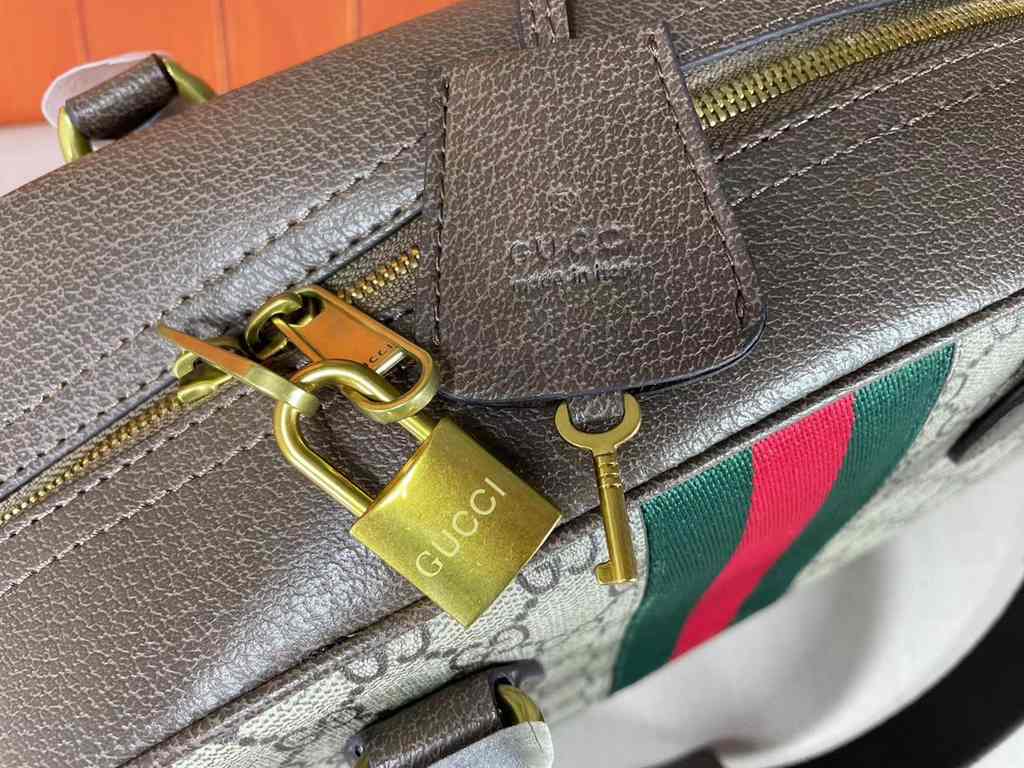 The Gucci Savoy Medium Bowling Bag makes a bold statement with the brand's recognizable GG pattern and striped webbing. The Gucci Savoy collection continues to evolve on the Gucci Star Talk runway, with new colorways rei