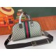 The Gucci Savoy Medium Bowling Bag makes a bold statement with the brand's recognizable GG pattern and striped webbing. The Gucci Savoy collection continues to evolve on the Gucci Star Talk runway, with new colorways rei