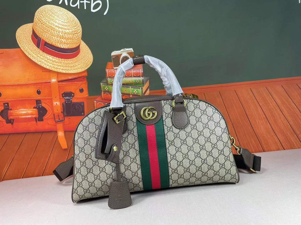 The Gucci Savoy Medium Bowling Bag makes a bold statement with the brand's recognizable GG pattern and striped webbing. The Gucci Savoy collection continues to evolve on the Gucci Star Talk runway, with new colorways rei