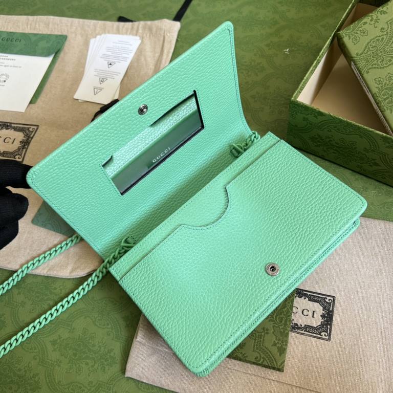 .   Packaged in a full set of original green boxes   This chain strap wallet from the GG Marmont collection revitalizes a design from previous collections and is crafted in a refreshing light green leather, bringing a st