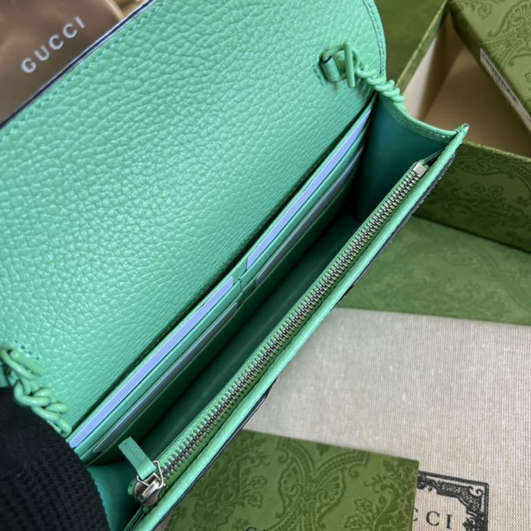 .   Packaged in a full set of original green boxes   This chain strap wallet from the GG Marmont collection revitalizes a design from previous collections and is crafted in a refreshing light green leather, bringing a st